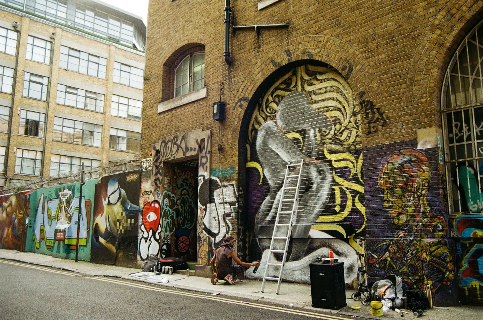 Street art on a brick wall around the corner from the studio